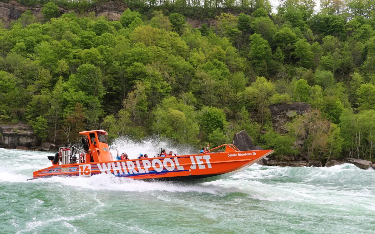 A jet boat cutting through standing waves in the Niagara River gorge
