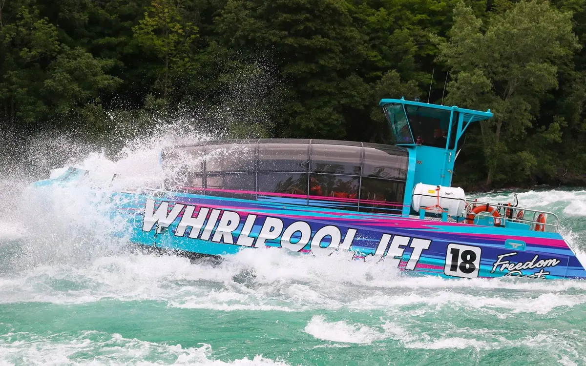 The jet boat idling in the green water of the Niagara River before a run